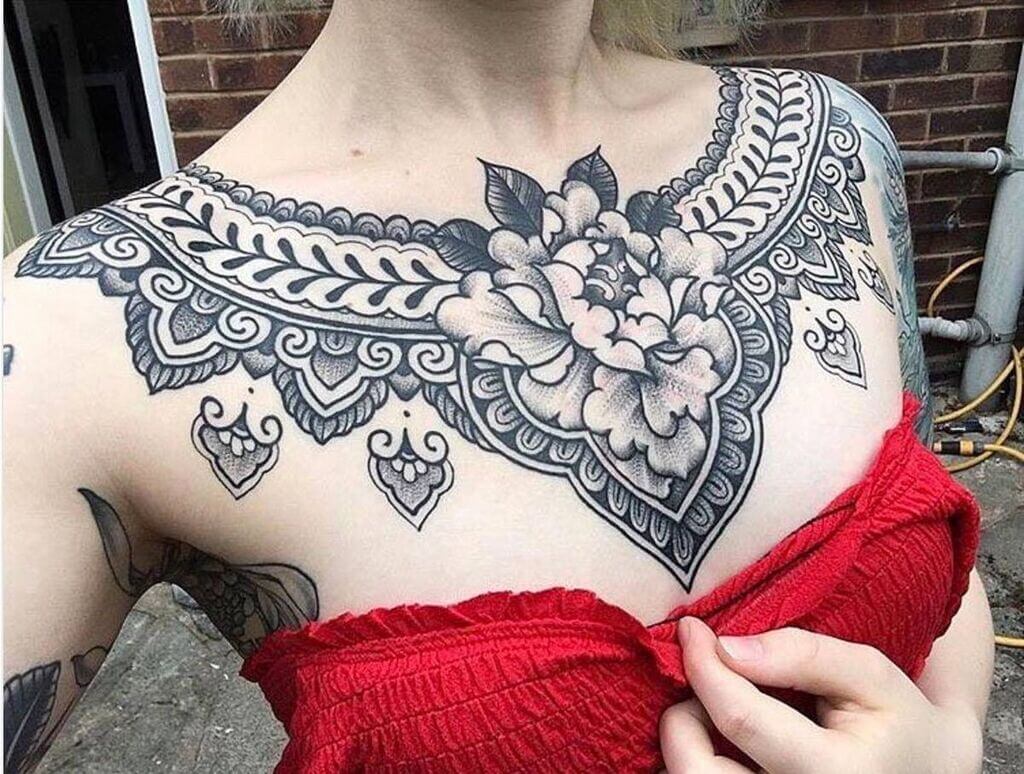 breast tattoo design