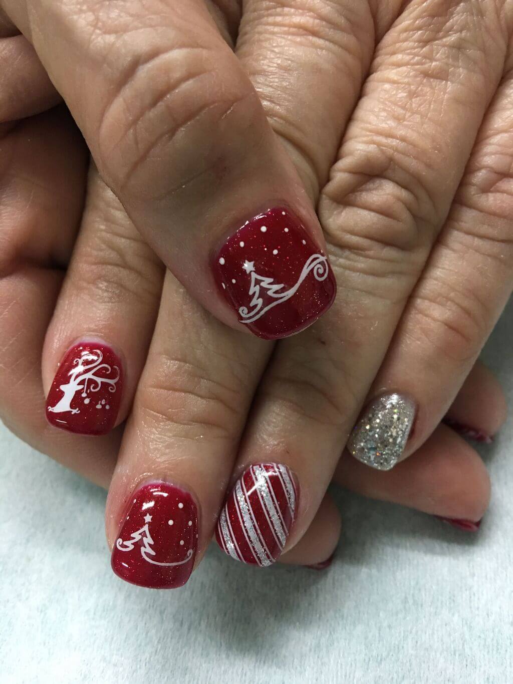 Silver Reindeer and Candy Cane Christmas Nails