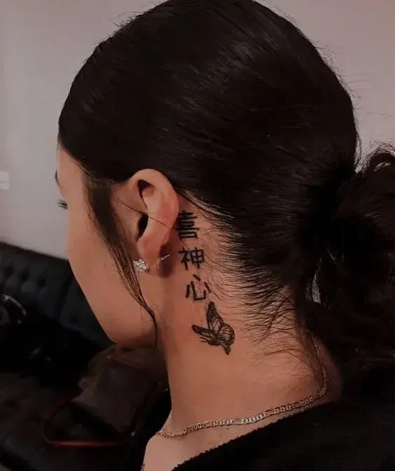 Asian Words and Butterfly Tattoo