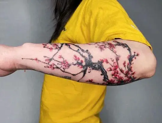 Plum Blossom Forearm Tattoo