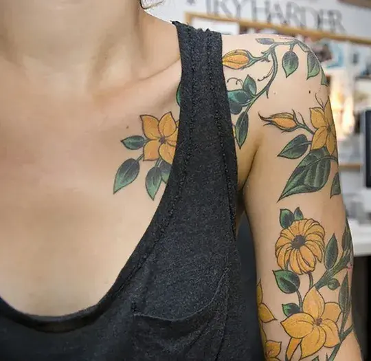 Yellow & Green Female Half Sleeve Tattoo