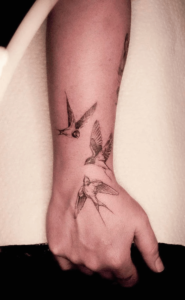 Bird Hand Tattoos