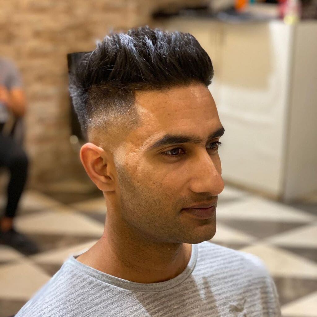 Medium Length Haircut With Bald Fade