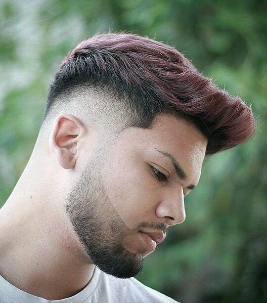 Mid Taper Fade with Pushed Forward Top