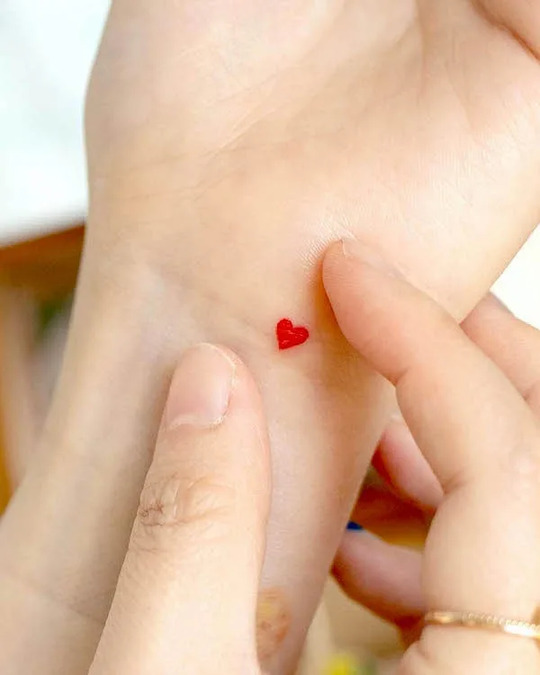 Small Heart hand Tattoo