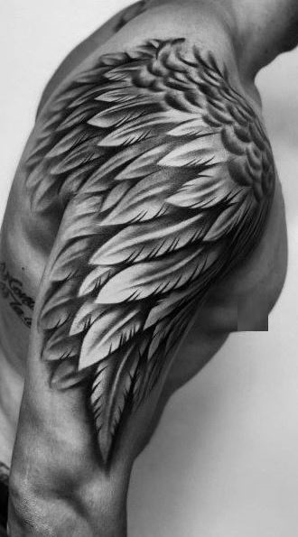 Angel wings tattoo on arm