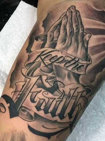 Religious Bicep Tattoos for men