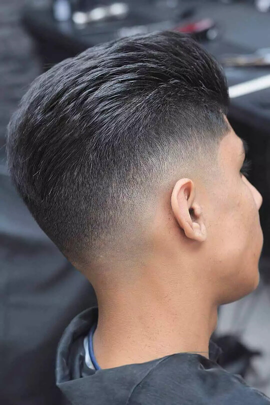 crew cut high fade slicked back hairstyle for men