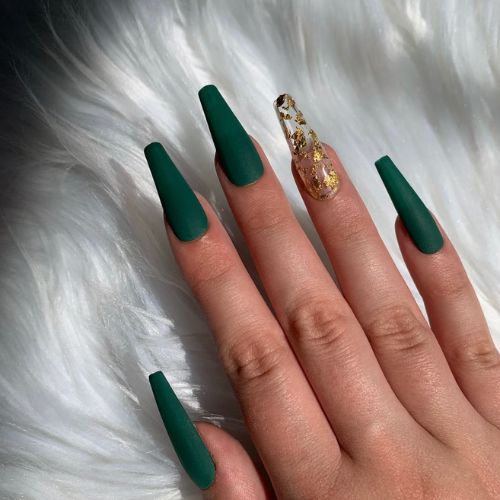 green with gold flake nail design